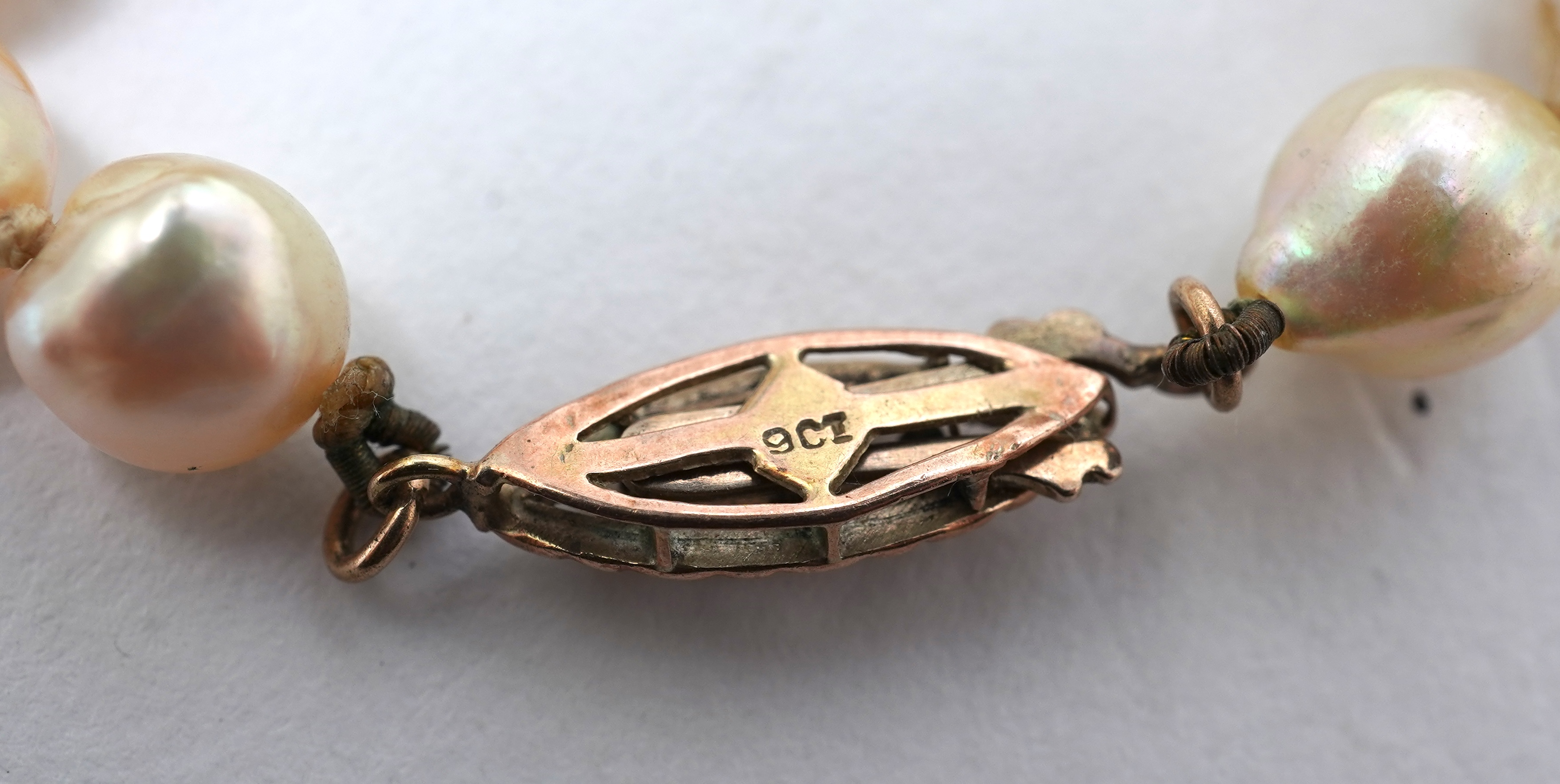 A collection of four cultured pearl necklaces